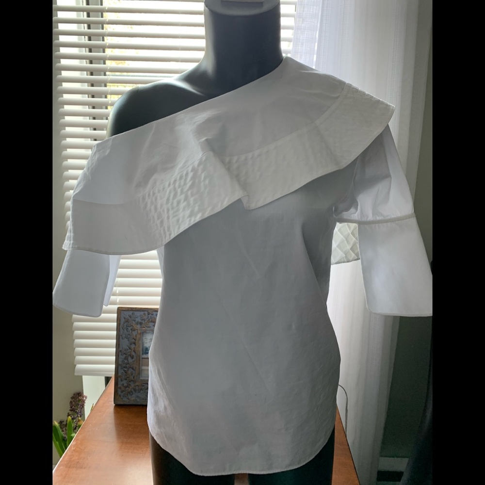 White off shoulder blouse by  Victoria Beckham